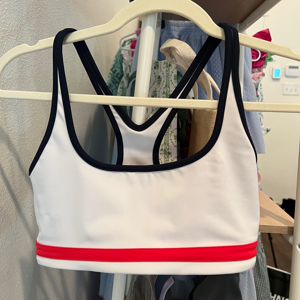 Splits59 white sports bra with blue and red trim
